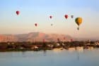 Luxor hot air balloon sunrise — balloons over the Valley of the Kings at dawn